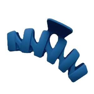 Matte Klein blue geometric hair claw clip with stylish wavy twisted design for women