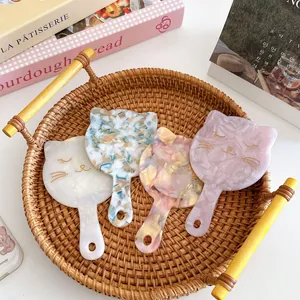 Chic acetate cat-shaped handheld mirrors in pearl finish and floral patterns