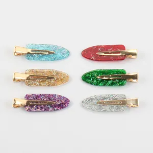 Set van 6 glitter haarspeldjes van hars met gouden metalen basis in diverse kleuren