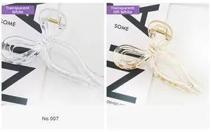 Detailansicht der 13cm großen Schleifen-Haarklammern in Transparent-Weiß und Beige