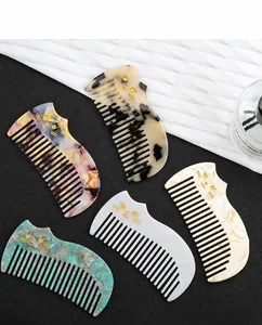 Cat-shaped acetate hair combs in various patterns with golden metallic cat whiskers details
