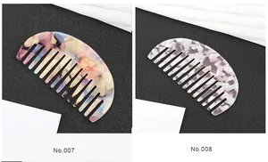 Detail of colorful acetate semi-circle hair combs with No.007 and No.008 marble patterns