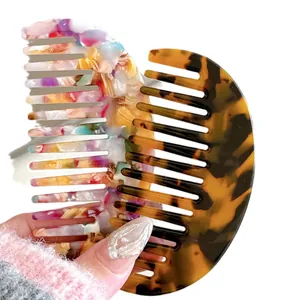 Elegant semi-circle acetate hair combs in colorful marble and classic tortoiseshell patterns