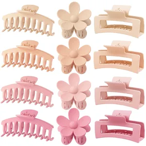 Detail van 12-delige matte haarklemmen set in roze en beige gradiënt kleurvarianten