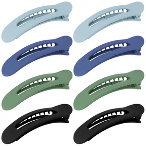 Lot de 8 grandes barrettes à cheveux mates en bleu, vert et noir sur fond blanc