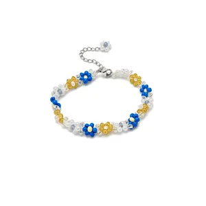 Handmade Korean style flower beaded bracelet with blue and yellow daisy charms and extension chain