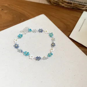 Sweet handmade beaded daisy flower bracelet with blue and white crystals for girls