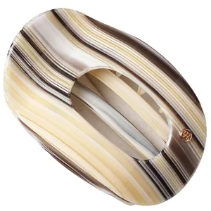 Elegant semi-round acetate hair claw clip with marble texture and gold logo detail