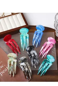 Détails des épingles à cheveux pieuvre aux motifs marbrés colorés et finition acétate