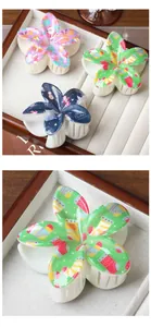 Détails de pinces à cheveux fleur de Noël avec motifs festifs de renne et père Noël