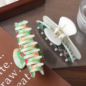 Christmas large 11.5cm hair claw clips with reindeer and festive patterns, set of two