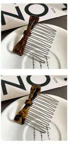 Close-up of tortoise shell pattern acetate bow hair comb with polished metal teeth