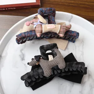 Set of two adorable plaid puppy plush claw clips with handmade tags and bow design