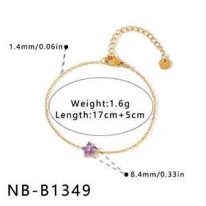 Detailed view of dainty gold stainless steel flower bracelet with purple zirconia