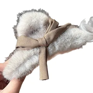 Winter plush floral hair claw clip in beige with brown fabric bow accent for women