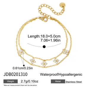 Élégant bracelet double couche en acier inoxydable doré avec trèfles en zircons