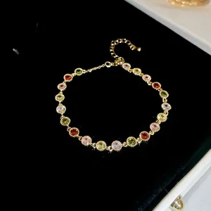 Luxury adjustable gold chain bracelet featuring round multi-colored sparkling zircon stones
