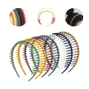 Macro shot of wavy anti-slip hair hoops with inner teeth in various matte candy colors