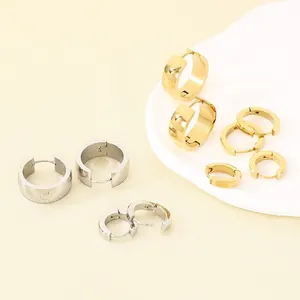 Minimalist stainless steel hoop earrings in gold and silver finishes for daily wear