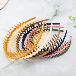 Macro shot of wave-shaped zigzag headbands in matte finish with assorted colors