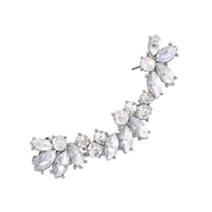 Detail of silver ear cuff with marquise zircons in a leaf-shaped bridal design