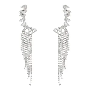 Detailed view of silver tassel drop earrings with long rhinestone fringe and zircon stones