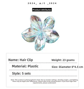 Vue détaillée d'une pince à cheveux fleur irisée de 8x4,5 cm avec une texture en plastique