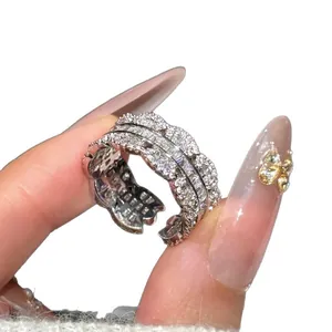 Elegant zircon scalloped open ring with shimmering micro-pave stones for women.