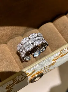Macro view of a sparkling zircon lace open ring nestled in a luxury jewelry box