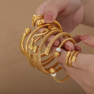 Luxurious gold stainless steel wire cable bracelets and ring set with zircon details