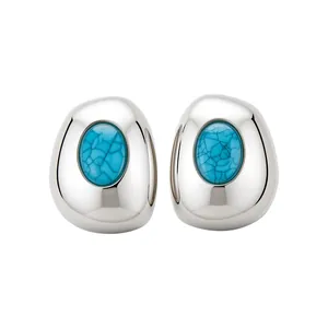 Geometric silver-toned stud earrings with oval turquoise-style resin inlay