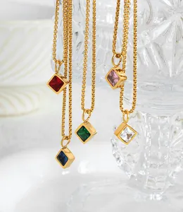 Close-up of square emerald and zircon pendant necklaces in five elegant colors