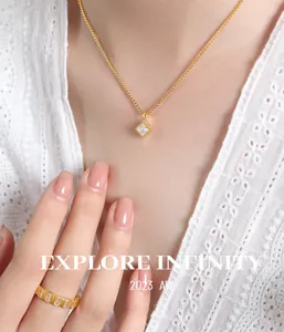 Close-up of vintage emerald glass pendant necklace and zircon ring on lace background