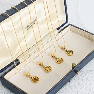 Traditional Chinese Double Happiness pendant necklace in 18k gold plated stainless steel
