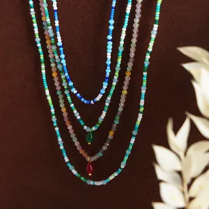 Bohemian multilayered handmade necklace featuring colorful faceted crystal beads and agates