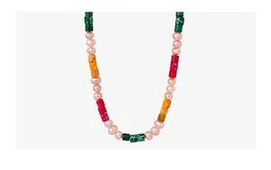 Detail of handmade necklace with freshwater pearls and multi-colored cylindrical stone beads
