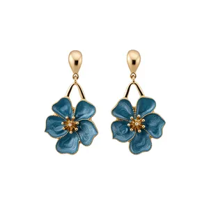 Elegant blue enamel flower drop earrings with golden accents for stylish women