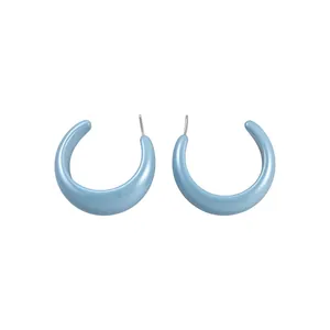 Stylish light blue C-shaped resin hoop earrings with a glossy dopamine candy color finish