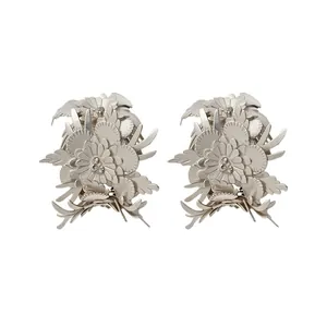 Vintage leather floral C-shaped stud earrings with a matte silver finish.