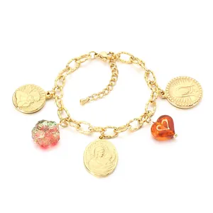 Bracelet à breloques vintage en acier doré avec médailles religieuses et pendentifs cœur