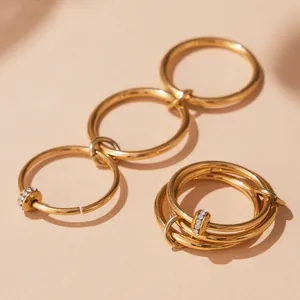 Three-piece stackable 18k gold plated stainless steel rings set with 5A cubic zirconia