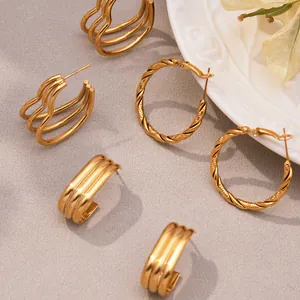 Three pairs of elegant 18k gold plated stainless steel hoop earrings in heart-inspired design