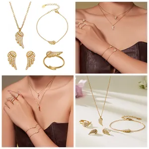 Close-up of 18k gold plated angel wing jewelry set with sparkling 5A cubic zirconia stones
