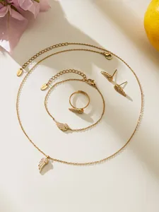 Detailed close-up of 18k gold plated angel wing jewelry set with sparkling 5A zircon stones