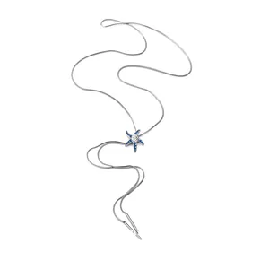 Elegant silver starfish lariat necklace with blue crystals and slender metallic tassels