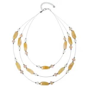 Bohemian triple-layered necklace with amber resin beads and champagne crystals