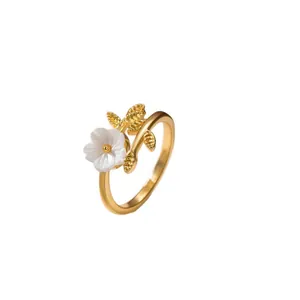 Gold-plated open ring for women featuring a delicate white flower and leaf design