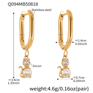 Detail of 18k gold plated cat earrings with zircon stones and stainless steel hoops