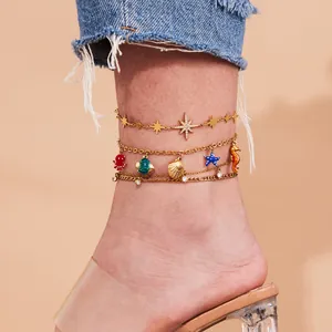 Bracelet de cheville doré à trois couches avec breloques marines et zircons pour femme
