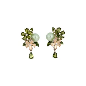 Elegant flower stud earrings with olive green zircon and pearl drop details for women